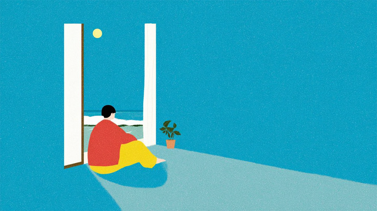 夜の部屋で一人座る人物の挿絵